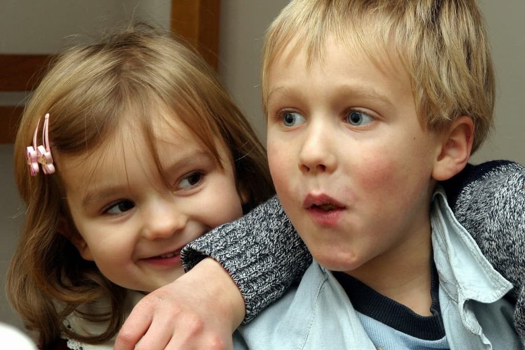 Annamaria as a child with one of her brothers